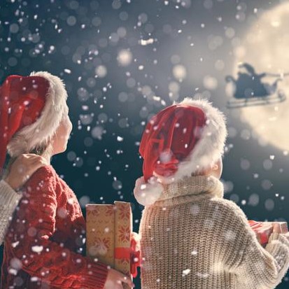 December 2018 E-Newsletter near syracuse ny image of children looking at santa sleigh in the sky from t gschwender & associates