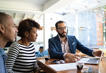 business auditors near syracuse ny image of business man meeting with client from T Gschwender and Associates